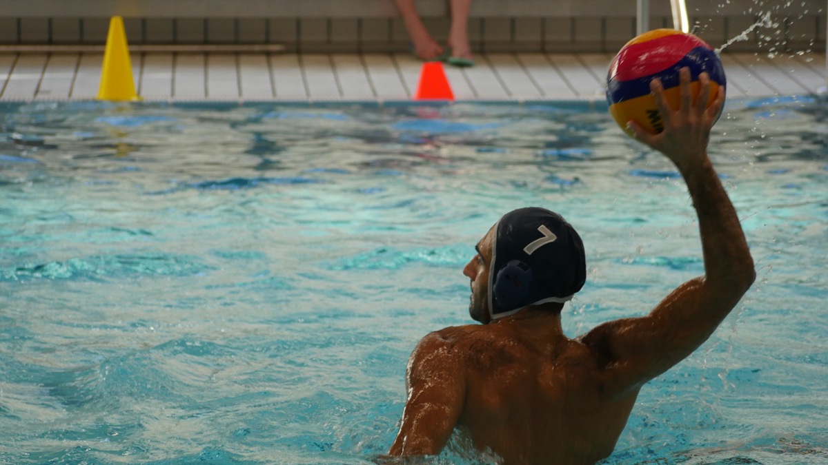 Water polo player in action during a match